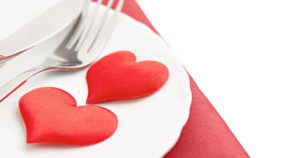 two red hearts at place setting